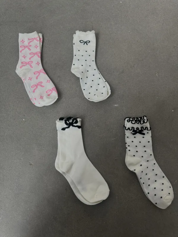 27 Bow Socks sold by 27 Boutique
