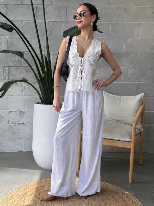 DEX Tie Front Eyelet Embroidered Top sold by 27 Boutique