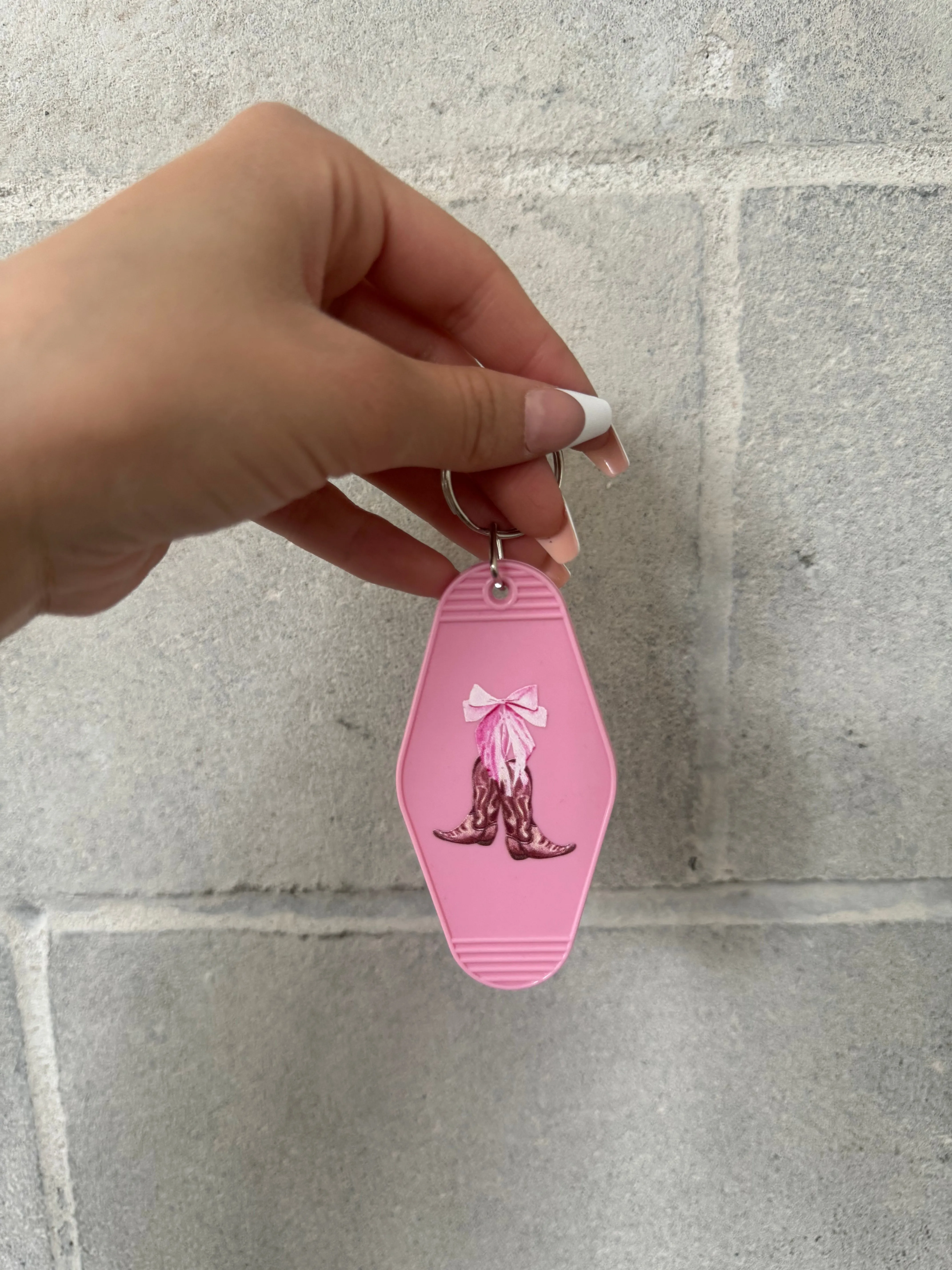 27 Cowboy Boot Bow Key Chain sold by 27 Boutique