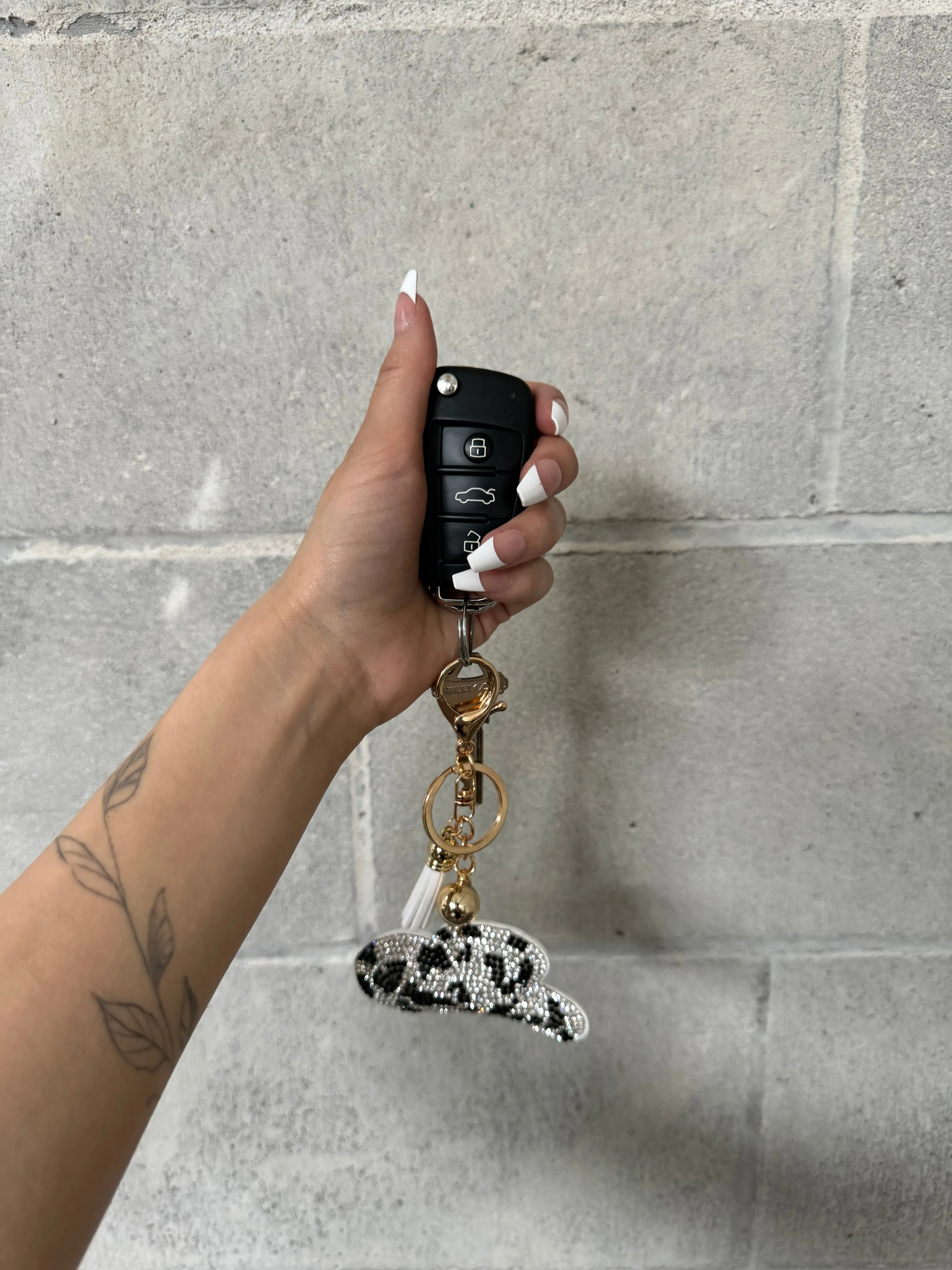 27 Rhinestone Cowboy Hat Key Chain sold by 27 Boutique