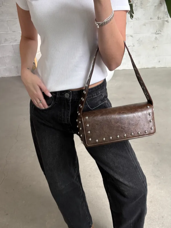 27 Faux Leather Studded Shoulder Bag sold by 27 Boutique