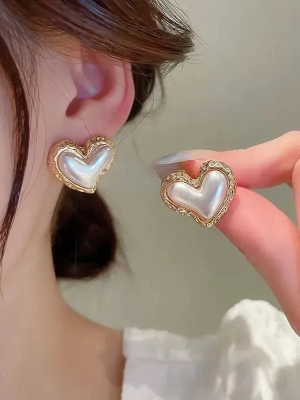 27 Pearl Heart Stud Earrings sold by 27 Boutique
