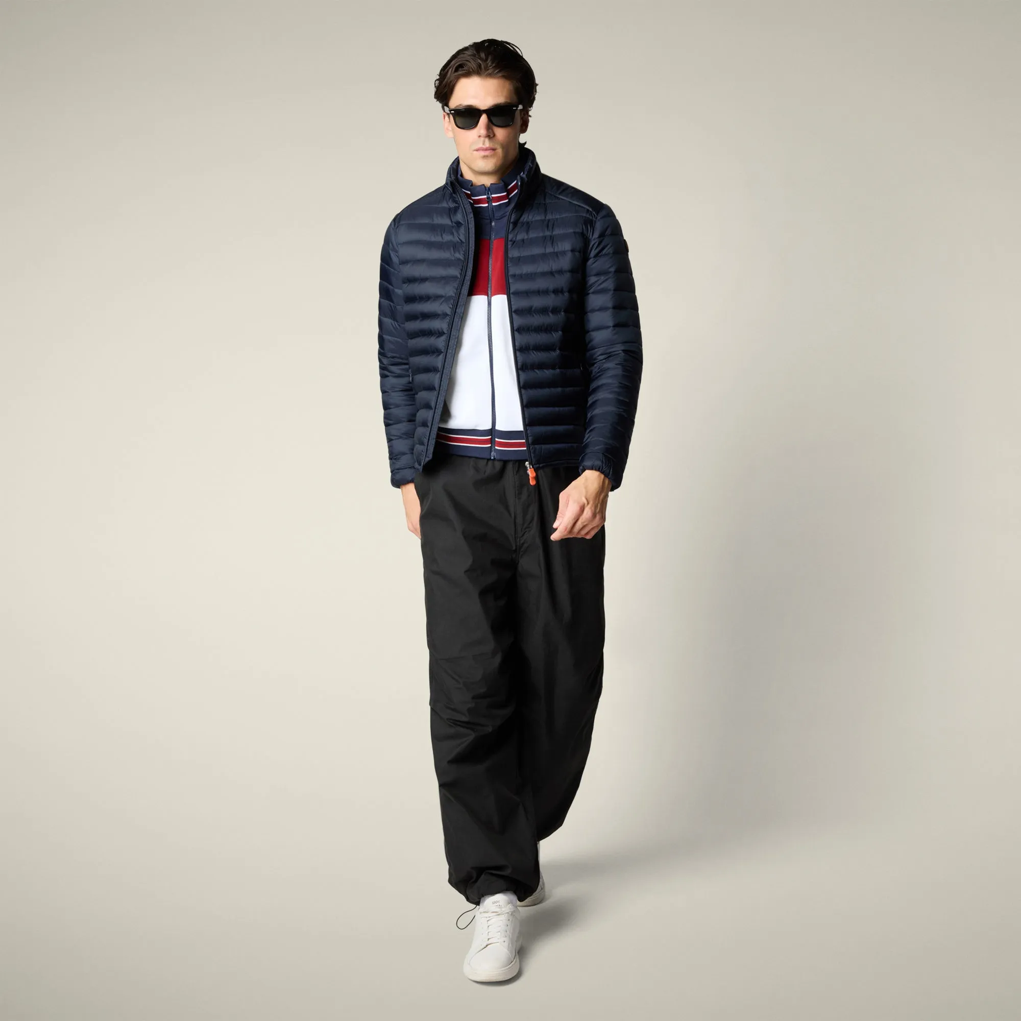 Men's animal free puffer jacket Cyrion in navy blue sold by Save The Duck