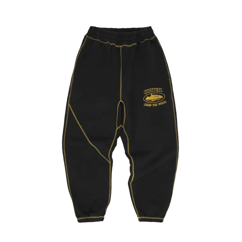ALCATRAZ CONTRAST SWEATPANT [BLACK / YELLOW] sold by Corteiz