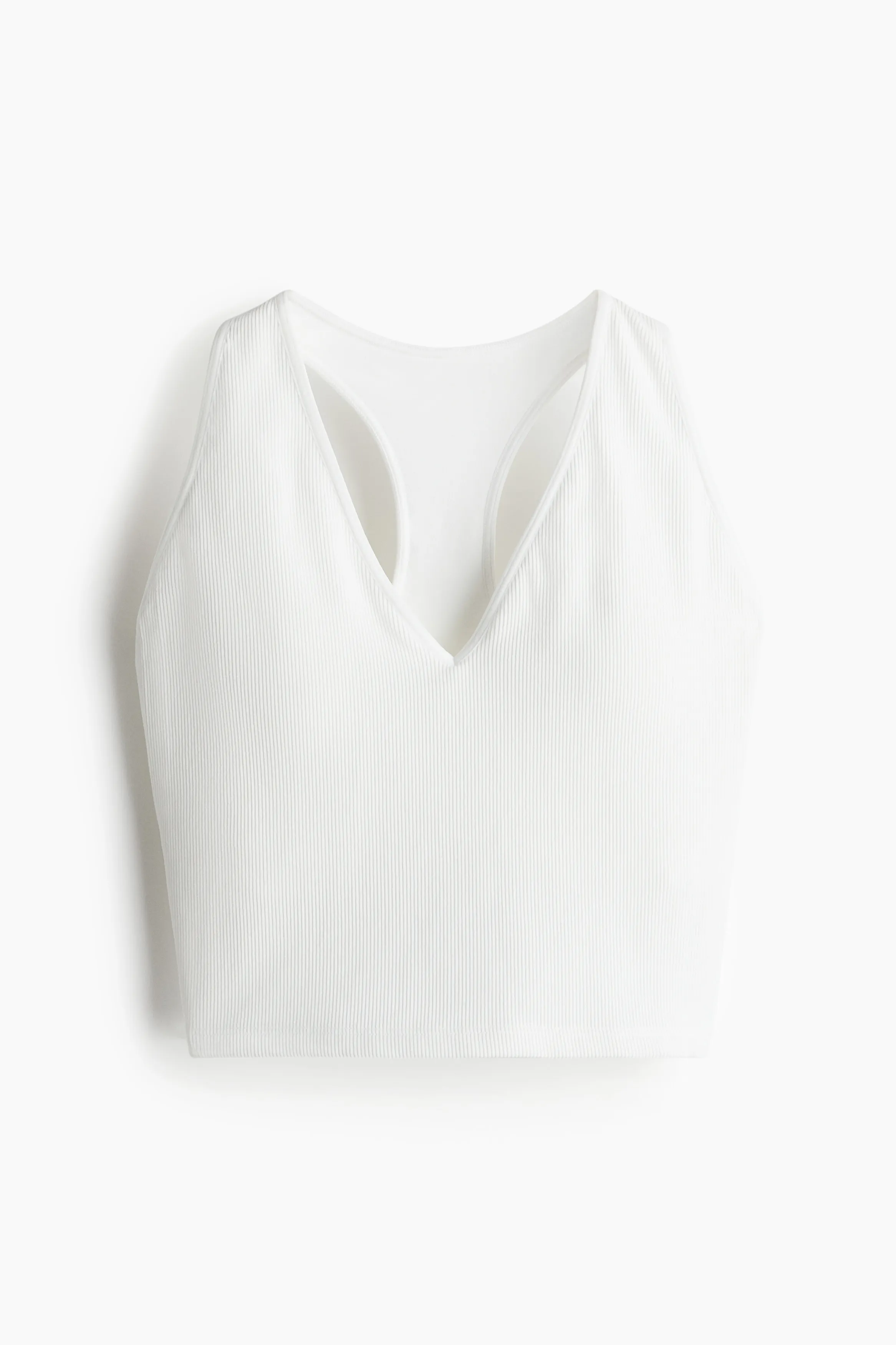 H&M - Seamless Medium Support Sports bra with DryMove™ - White sold by H&M