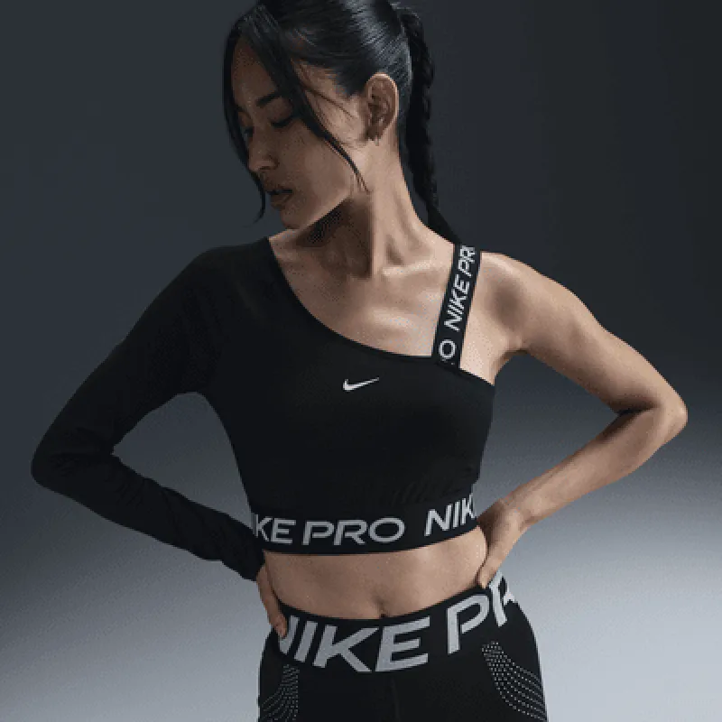 Nike Pro Shine Women's Dri-FIT Asymmetrical Cropped Top sold by Nike
