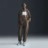 Nike Sportswear Essential Women's Mid-Rise Oversized Woven Joggers sold by Nike