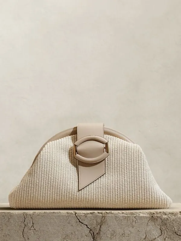 Stella Straw Clutch sold by Banana Republic