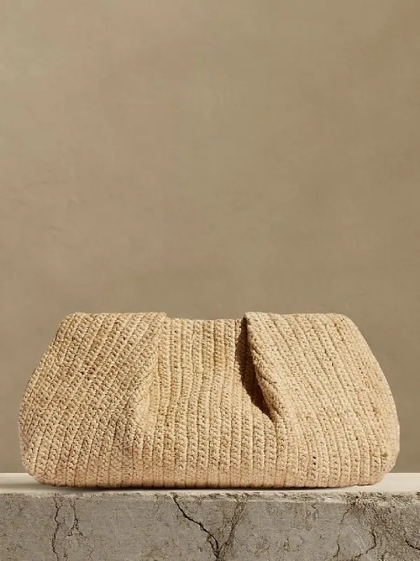 Riviera Raffia Clutch sold by Banana Republic