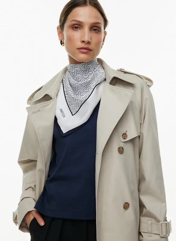 elite monogram silk scarf sold by Aritzia