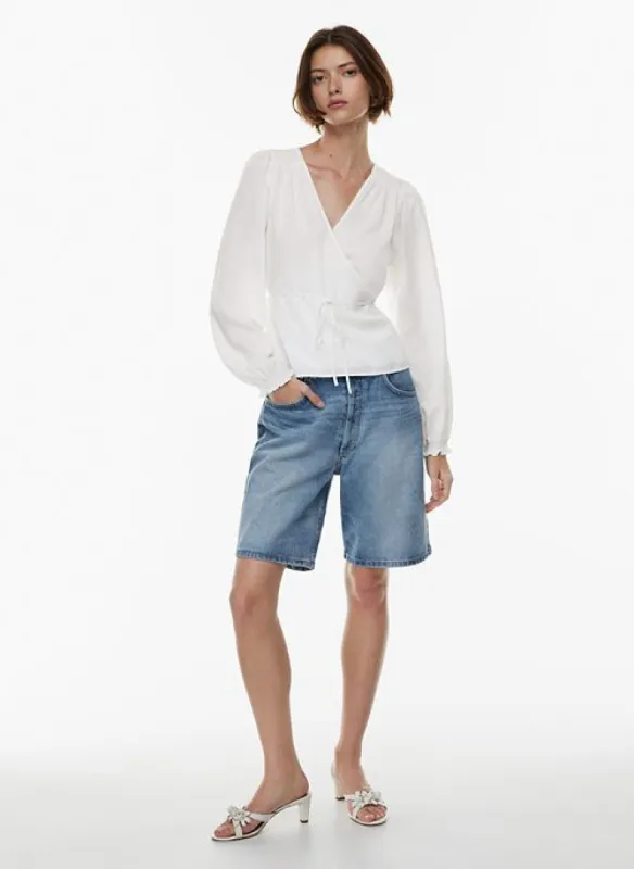 gracious blouse sold by Aritzia
