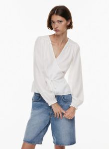 gracious blouse sold by Aritzia