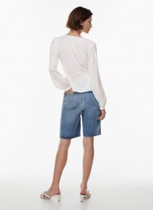 gracious blouse sold by Aritzia