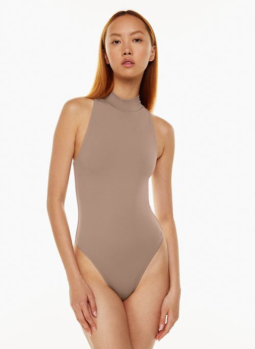 contour mockneck bodysuit sold by Aritzia