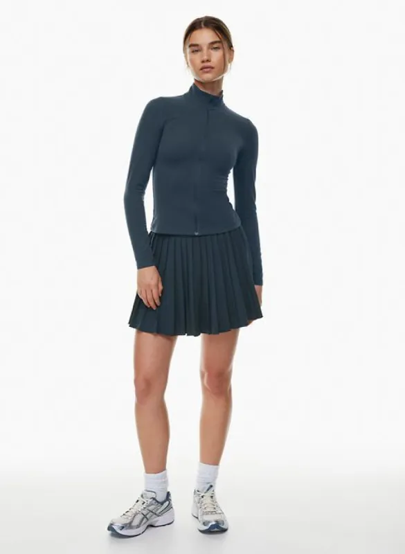 tnamove™ tennis mini pleated skirt sold by Aritzia