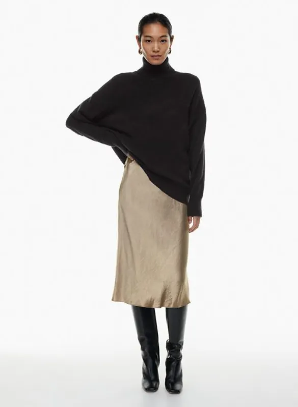 slip satin midi skirt sold by Aritzia