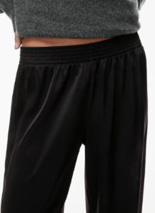 tribute satin pant sold by Aritzia