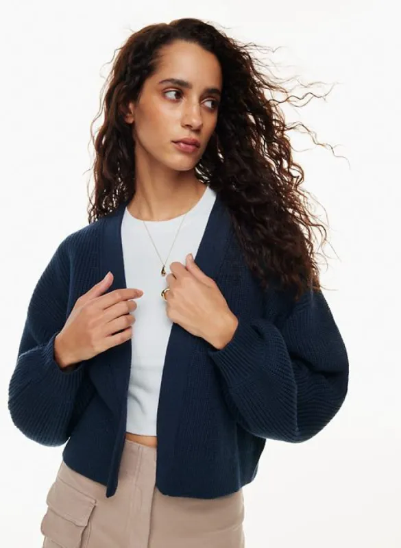 unwind waist cardigan sold by Aritzia