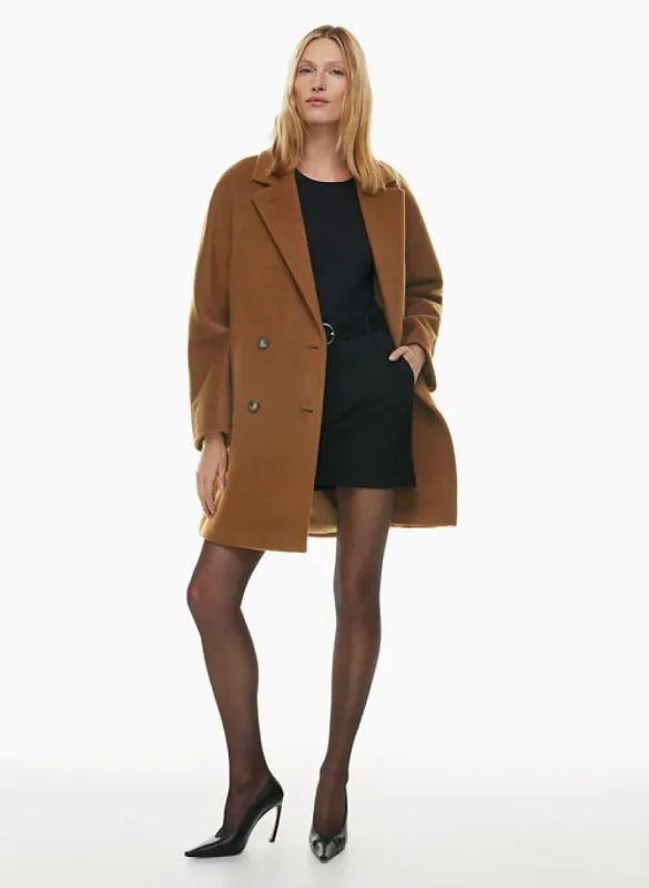 the slouch™ coat mid sold by Aritzia