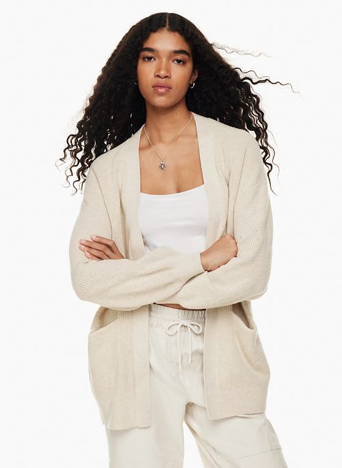 unwind cardigan sold by Aritzia