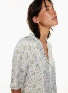 beso satin shirt sold by Aritzia