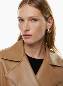 new tabloid trench coat sold by Aritzia