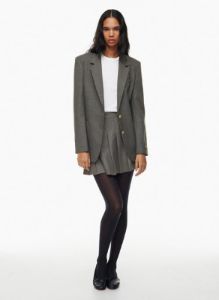 olive micro pleated skirt sold by Aritzia