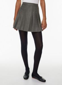 olive micro pleated skirt sold by Aritzia