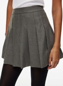 olive micro pleated skirt sold by Aritzia