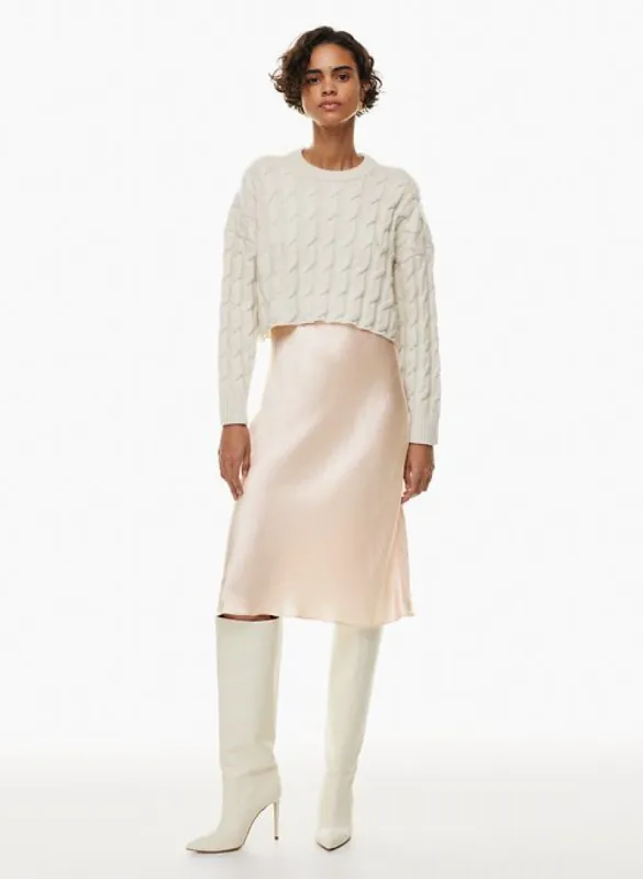 slip satin midi skirt sold by Aritzia