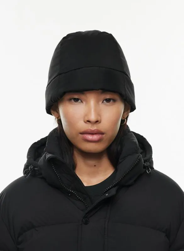 the super puff™ beanie sold by Aritzia