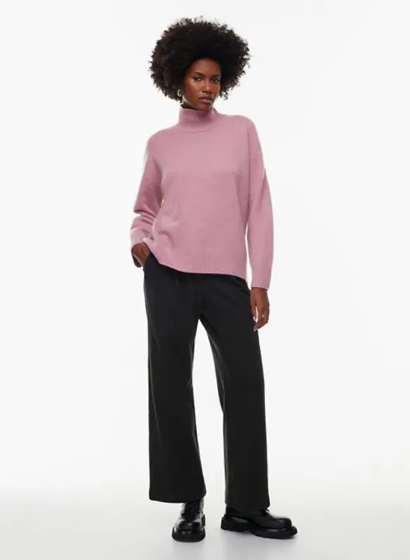 crema cashmere turtleneck sold by Aritzia