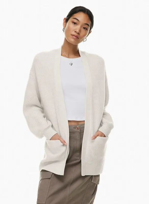 unwind cardigan sold by Aritzia