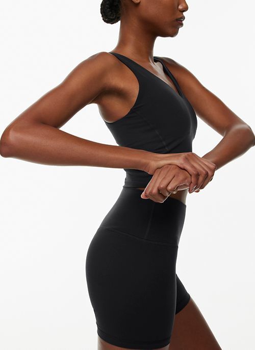 butter vitality sports tank sold by Aritzia