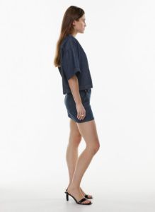 the jane boxy denim shirt sold by Aritzia
