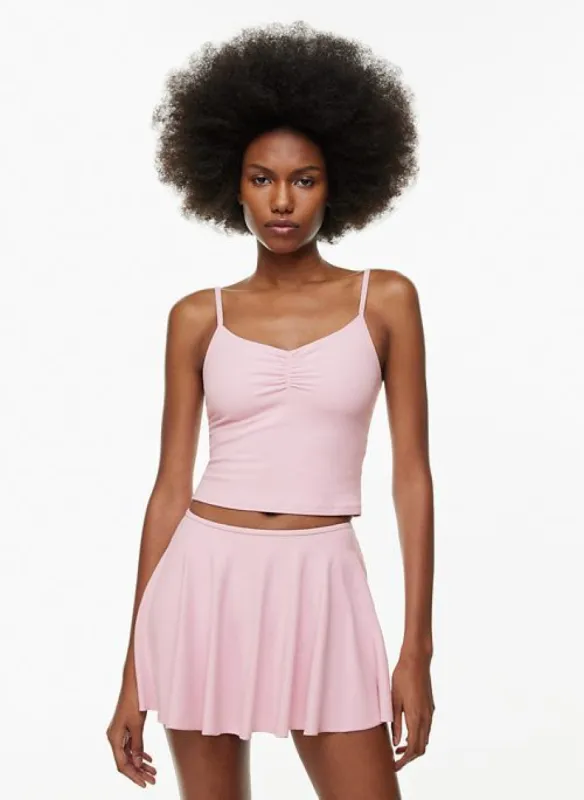 butter raise tank sold by Aritzia