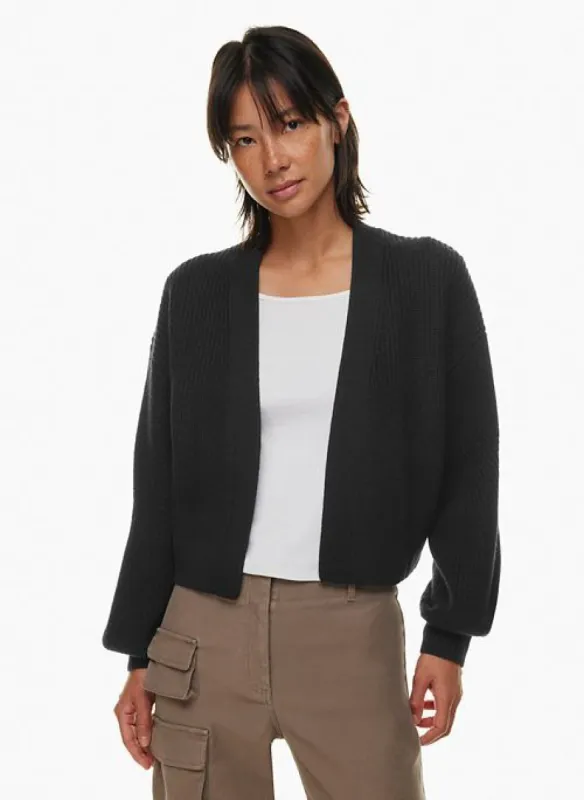 unwind merino wool waist cardigan sold by Aritzia