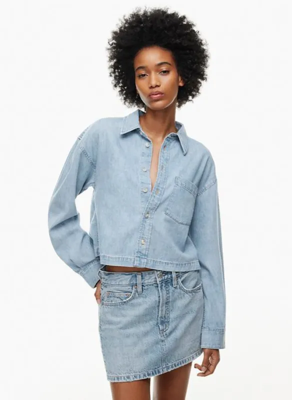 the 90s carla oversized denim shirt sold by Aritzia