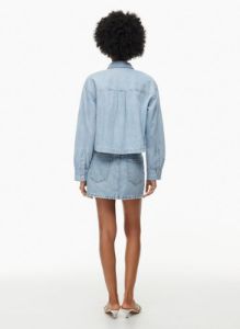 the 90s carla oversized denim shirt sold by Aritzia