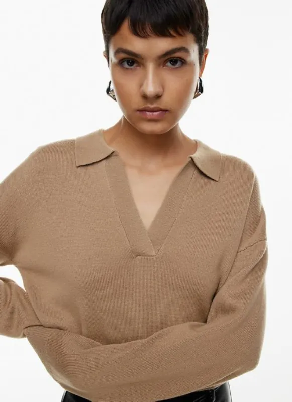clara merino wool waist cardigan sold by Aritzia