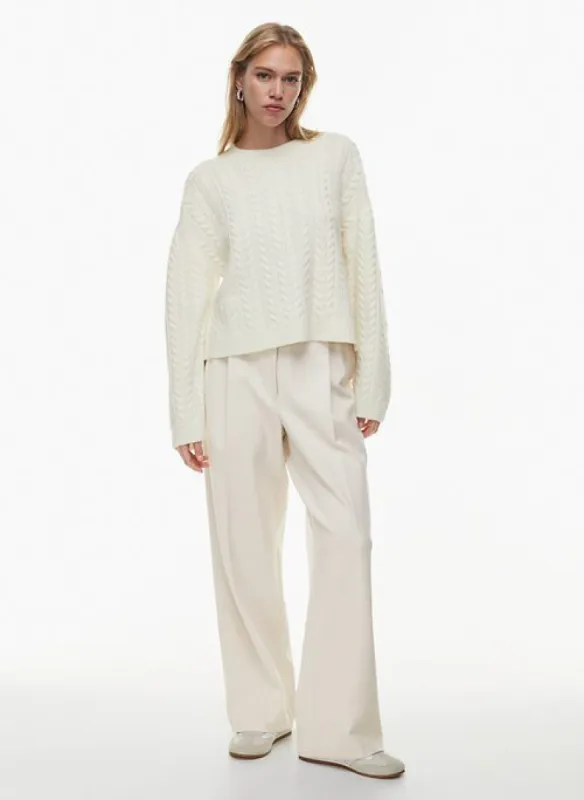 shores merino wool sweater sold by Aritzia