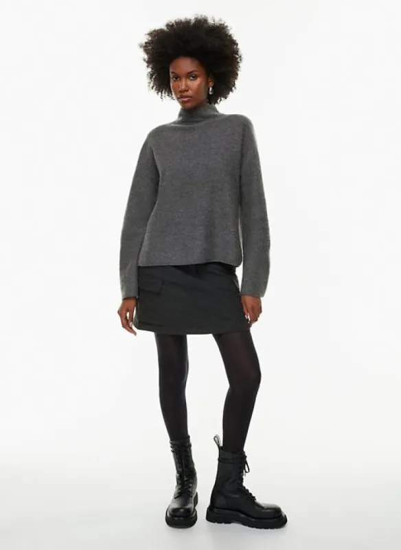 tandem merino wool turtleneck sold by Aritzia