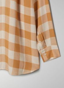 boyfriend button-up shirt sold by Aritzia