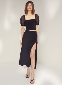 sheer-sleeve top sold by Aritzia