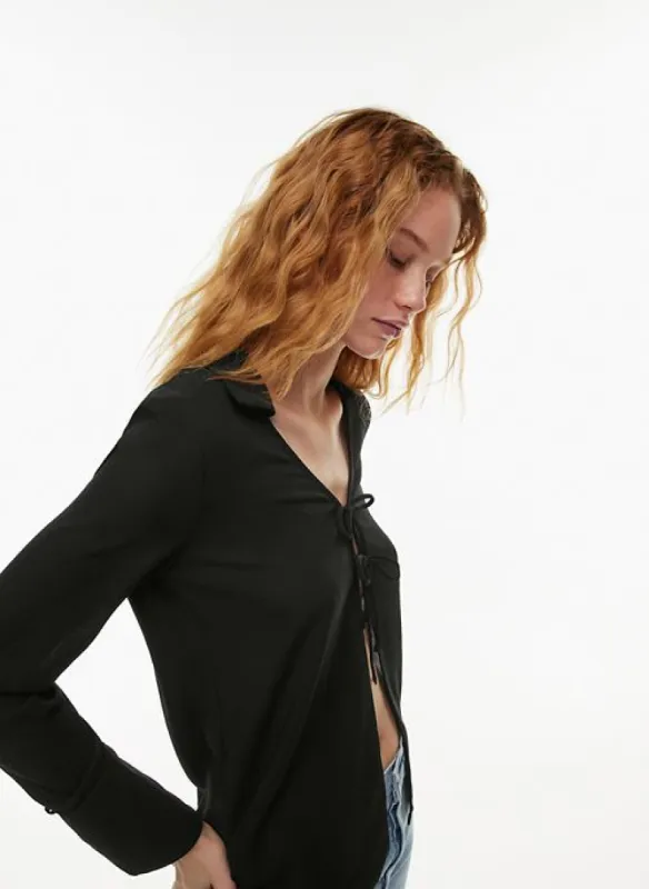 favor blouse sold by Aritzia