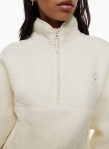 polartec® thermal pro® 1/2 zip sweater sold by Aritzia