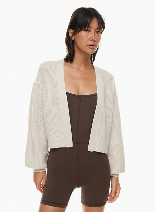 unwind waist cardigan sold by Aritzia