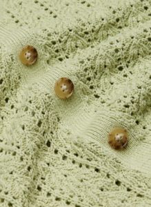 reverence cardigan sold by Aritzia