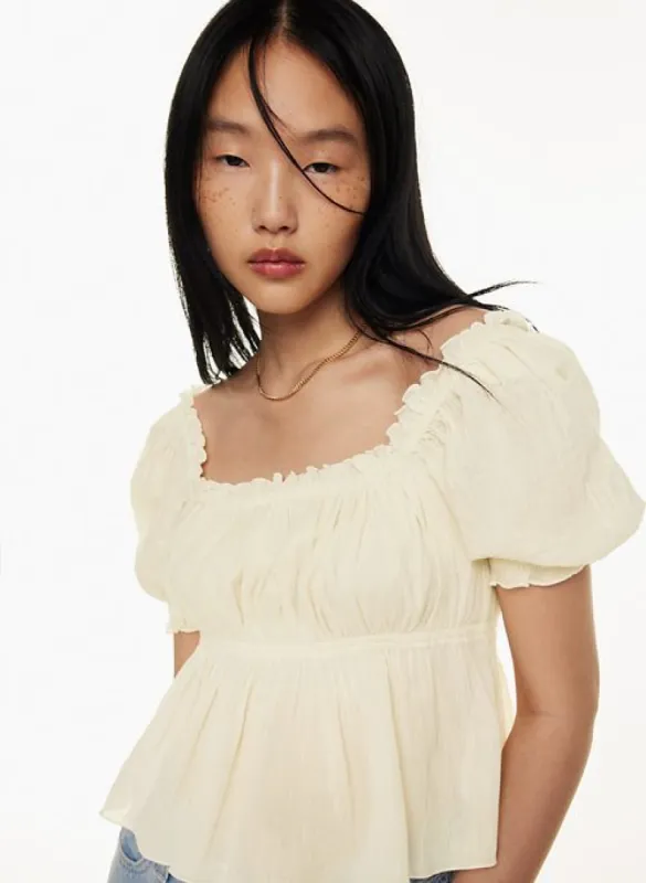 charming blouse sold by Aritzia