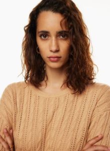 library sweater sold by Aritzia